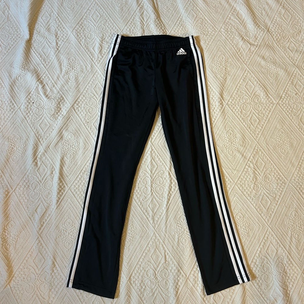 Black Adidas track pants